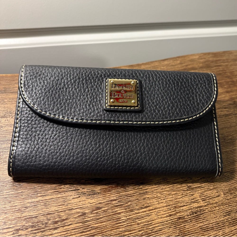 Dooney & Bourke Black Pebbled Leather long wallet with Gold Plaque